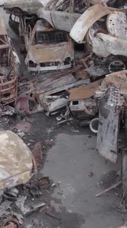 Vertical Video of a Dump of Destroyed Cars During the War in Ukraine