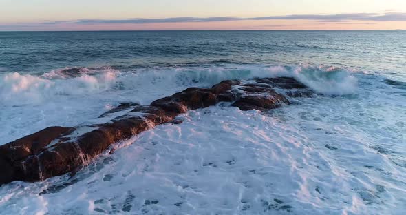 Waves crashing to the rocks