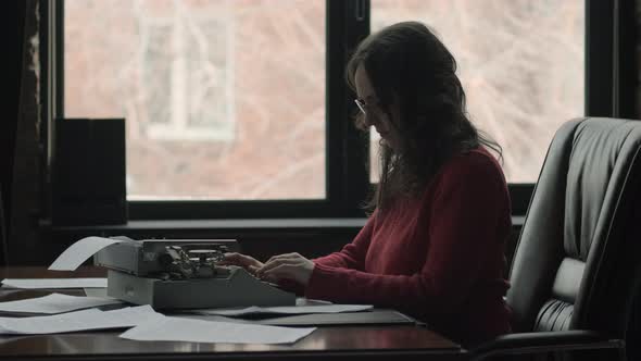 Female Screenwriter Scenarist Using Typewriter