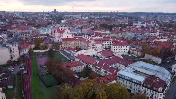Aerial flying over Vilnius old town on cloudy day, Lithuania