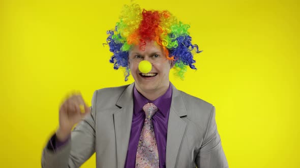 Clown Businessman Manager Entrepreneur Boss in Wig Show Ok Sign. Halloween