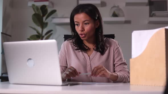 HR Woman Holds Meeting in Front of Laptop in Office with Resume Spbi