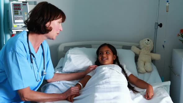 Female doctor interacting with patient