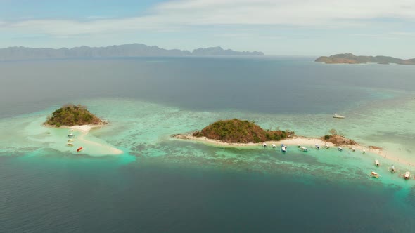 Small Torpic Island with a White Sandy Beach Top View