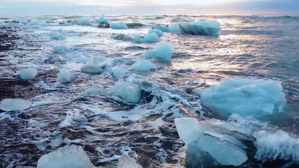 Icebergs in the Ocean Huge Chunks of Blue Ice Floating on the Waves Arctic Landscape Aerial View