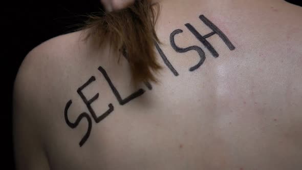 Selfish Written on Female Body Closeup, Bullying Victim Suffering Pressure