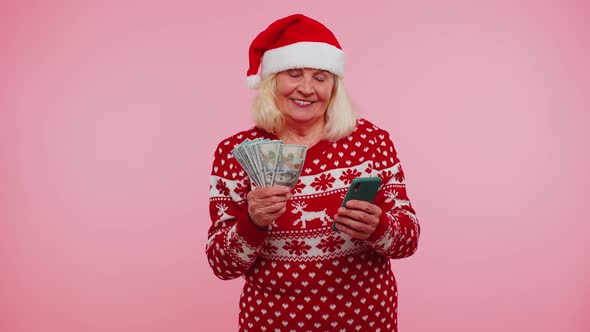 Christmas Grandmother Looking Smartphone Sincerely Rejoicing Win Success Luck Receiving Money Online