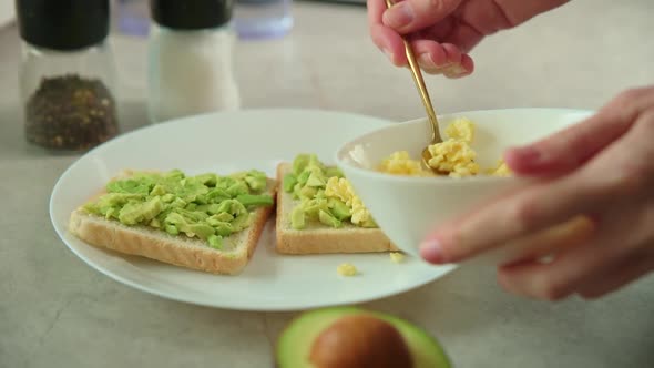 Woman Prepare Toasts with Avocado Healthy Nutrition