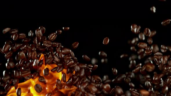 Super Slow Motion Shot of Flames and Coffee Beans Explosion on Black Background at 1000Fps