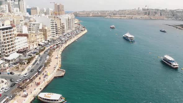 Aerial Pull Back Shot Of Sliema Coast In Malta