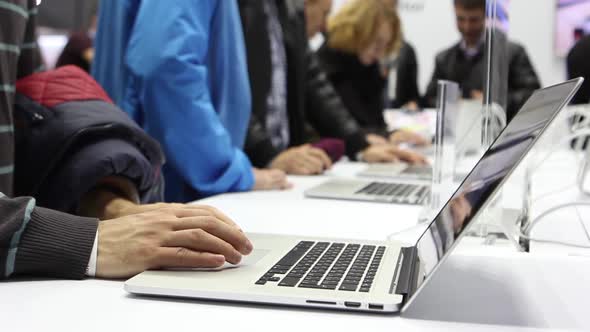 People Working In The Internet Cafe