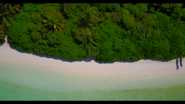 Aerial top down seascape of paradise coast beach trip by aqua blue water with white sandy background