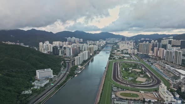 Aerial Drone view of Shatin Horse Racecourse in Shing Mun River, Hong Kong