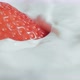 Fresh strawberries fall into yogurt. Organic ripe strawberry. Close up - VideoHive Item for Sale