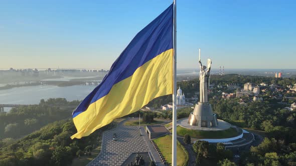 Ukrainian Flag in the Morning at Dawn. Aerial. Kyiv. Ukraine