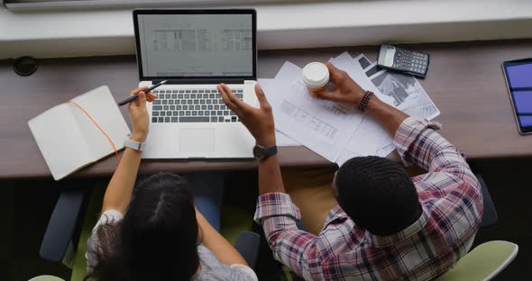 Business people working on laptop in a modern office 4k