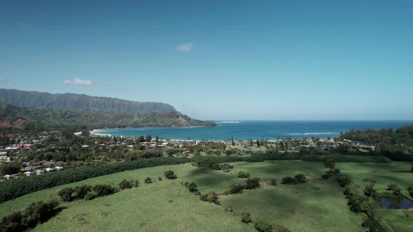 Mountains and tropical beaches, Hanalei Bay and Princeville, north shore Kauai, aerial panorama