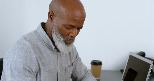 Businessman Using Mobile Phone on Desk 4k