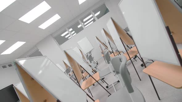 Workplaces with Folding Whiteboards in Art School Classroom