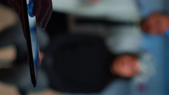 Vertical Video Close Up of Scientist in Neurological Dysfunctions Working at Tablet