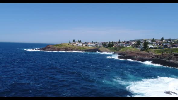 Aerial footage of Keleula Head near Kiama in regional New South Wales in Australia