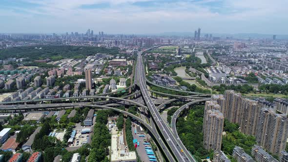 Aerial view of highway and overpass in city