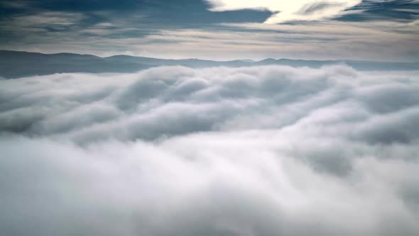 8K Above The Clouds From Mountain Summit