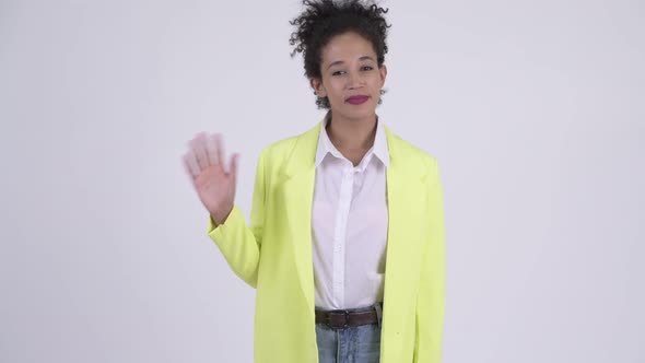 Happy Young Beautiful African Businesswoman Waving Hand