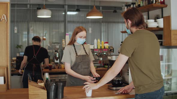 Barista Medical Face Mask in Coffee Shop Lockdown Quarantine Coronavirus is Over Back to Normal