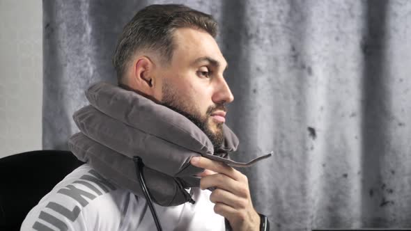 Young Bearded Business Coach Gives an Online Lesson About Medical Orthopedic Collar Neck Brace for