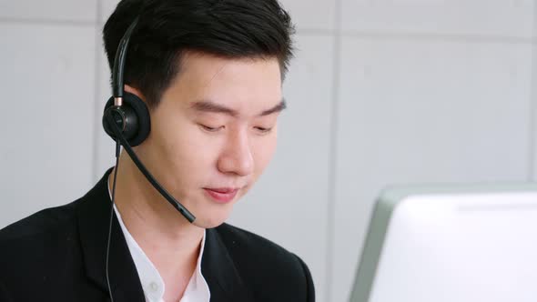 Business People Wearing Headset Working in Office