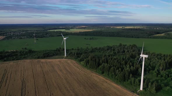 Windmills in Summer in a Green Field