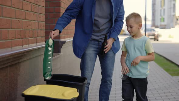 Dad Teaches His Son to Properly Sort Garbage