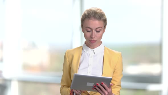 Young Charming Business Lady Using Digital Tablet.