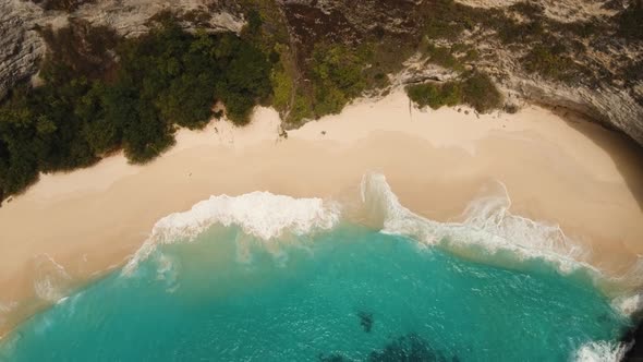 Rocky Cliff with Beach in the Sea. Karang Dawa.