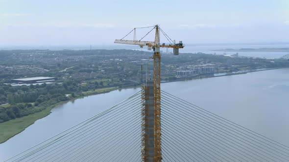Tall Crane and Cable Stayed Bridge in the Late Construction Phase