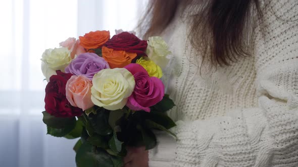 Closeup View of Woman Holding Beautiful Rose Bouquet