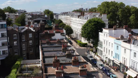 Forwards Fly Over Row of Houses