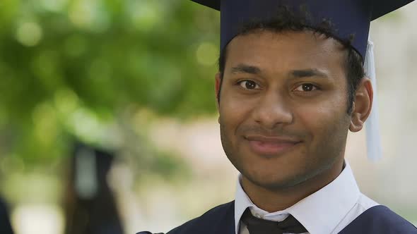 Happy Biracial Student Showing International Diploma, Quality Education System