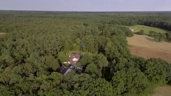 A drone flight over the Kempen forest and village in Belgium near to Antwerp. A drone flight over a