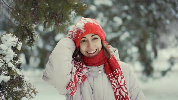 Slow Motion Portrait Happy Smiling Woman in Knitted Red Beanie Scarf and Mittens