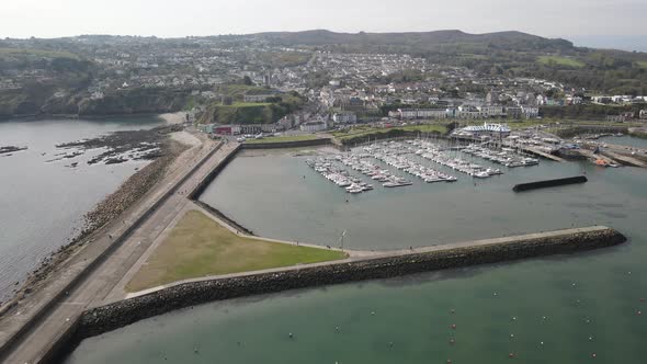 Aerial View Of Howth Pier With Boats Moored In Dublin, Ireland. drone shot