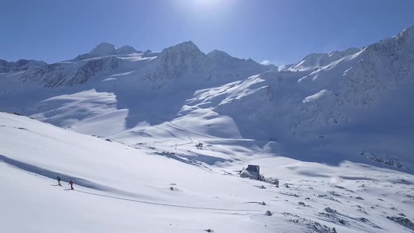 Two people ski touring in the mountains of South Tyrol