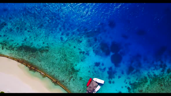 Aerial top view tourism of tropical tourist beach wildlife by shallow lagoon with white sand backgro