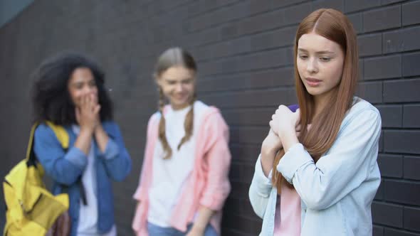 College Students Gossiping About New Red-Haired Classmate, Psychological Trauma