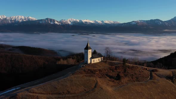 Church of St. Primoz and Felicijan on Sunny Day. Jamnik, Slovenia