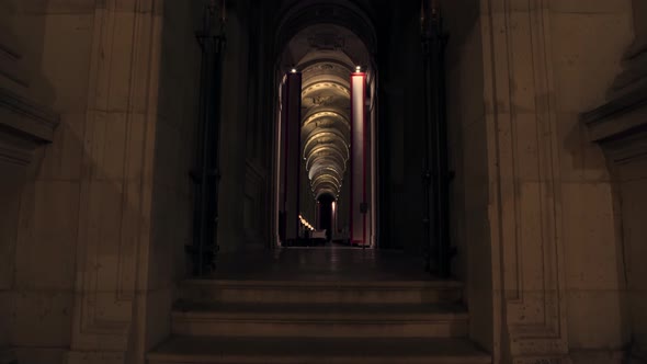 Tilt Up Shot of Arch of Cafe Marly in Paris in Night