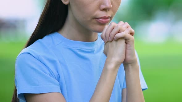 Religious Young Female Praying to God in Park, Hoping for Help, Life Problems