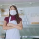 young attractive asian female cafe coffee shop owner wear uniform - VideoHive Item for Sale