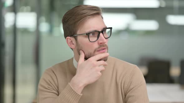 Pensive Young Creative Man Thinking Getting Idea